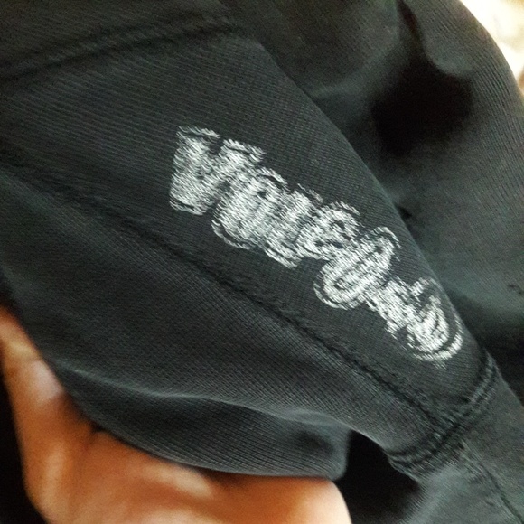 A black/gold colored Volcom Special Forces jacket - Picture 7 of 7